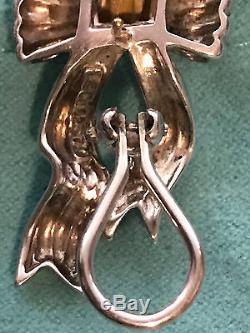 Tiffany & Co. Vintage Bow earrings. Sterling Silver and 18k gold