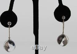 Vintage Sterling Silver Pools Of Light Earrings with Floral Encasement